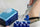 Laboratory technician transferring prepared samples into small tubes for contaminant analysis