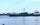 Small fishing boat and cargo vessel sharing the Kapuas River in West Kalimantan