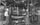 Workers operating a bottling machine on a 1919 packaging line