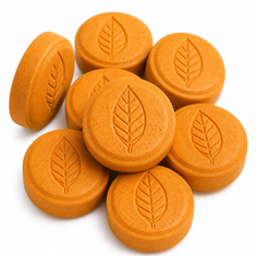 Orange Mango 150mg MIT chewable tablets on a white background